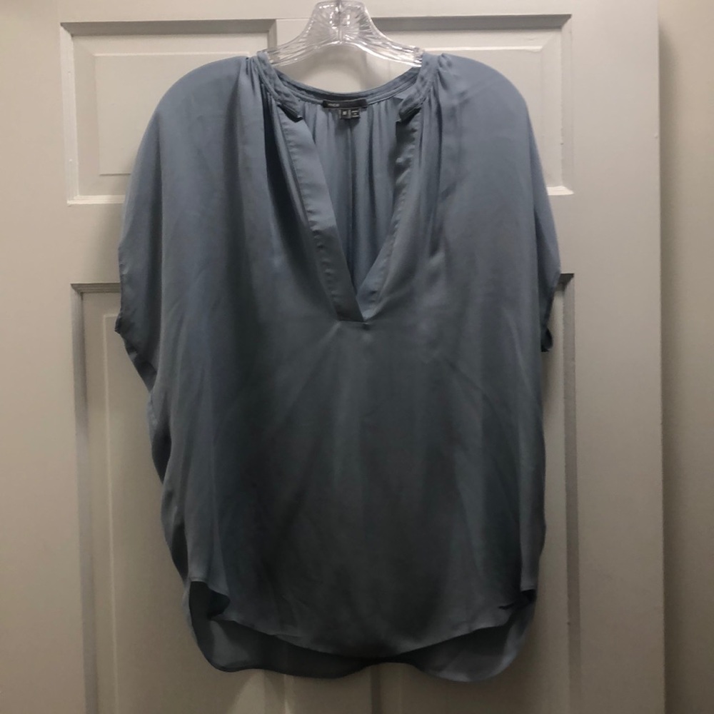 Vince. Light blue silk top. Short flutter sleeve. V-neck. Longer in back.